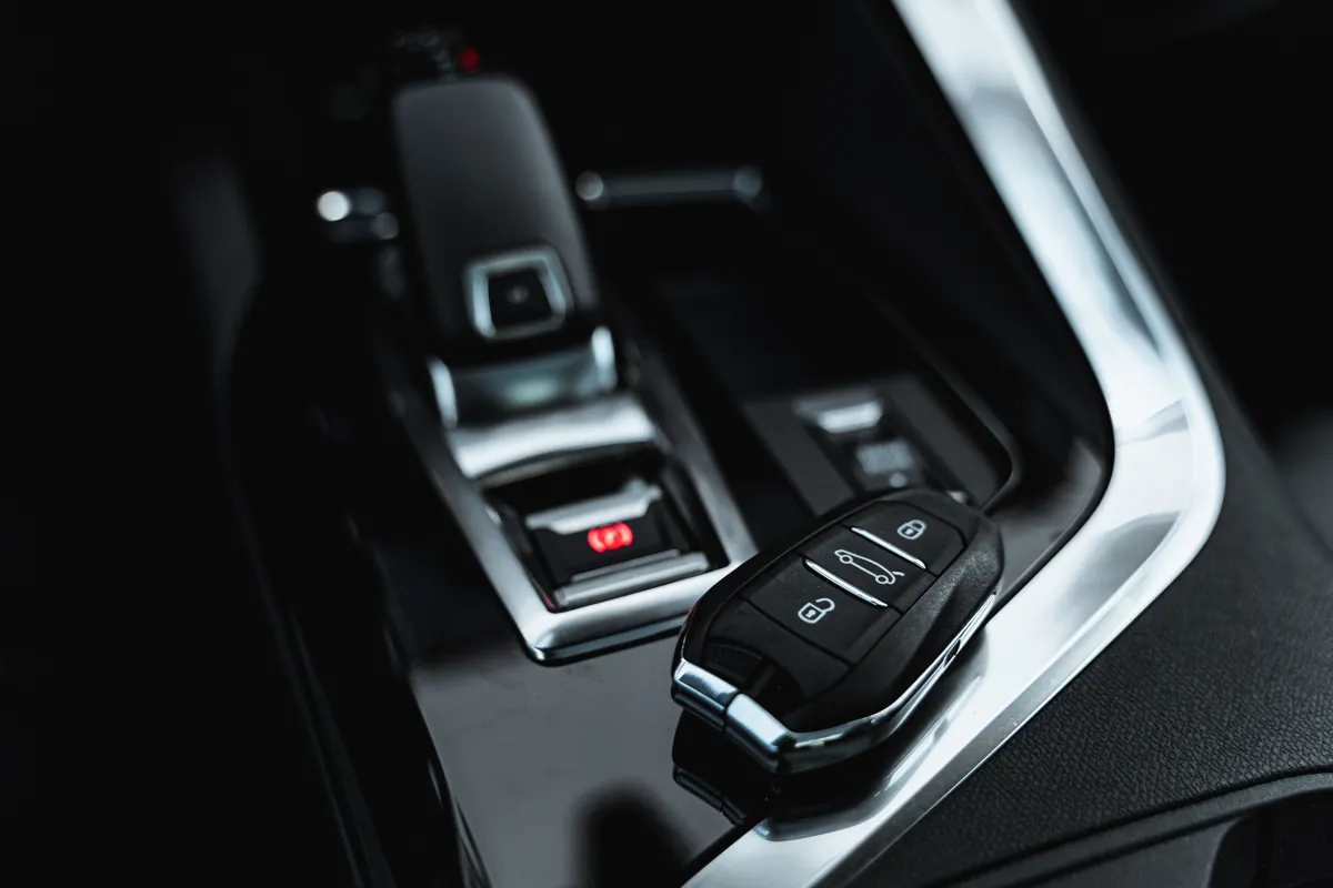 Car key beside a vehicle interior